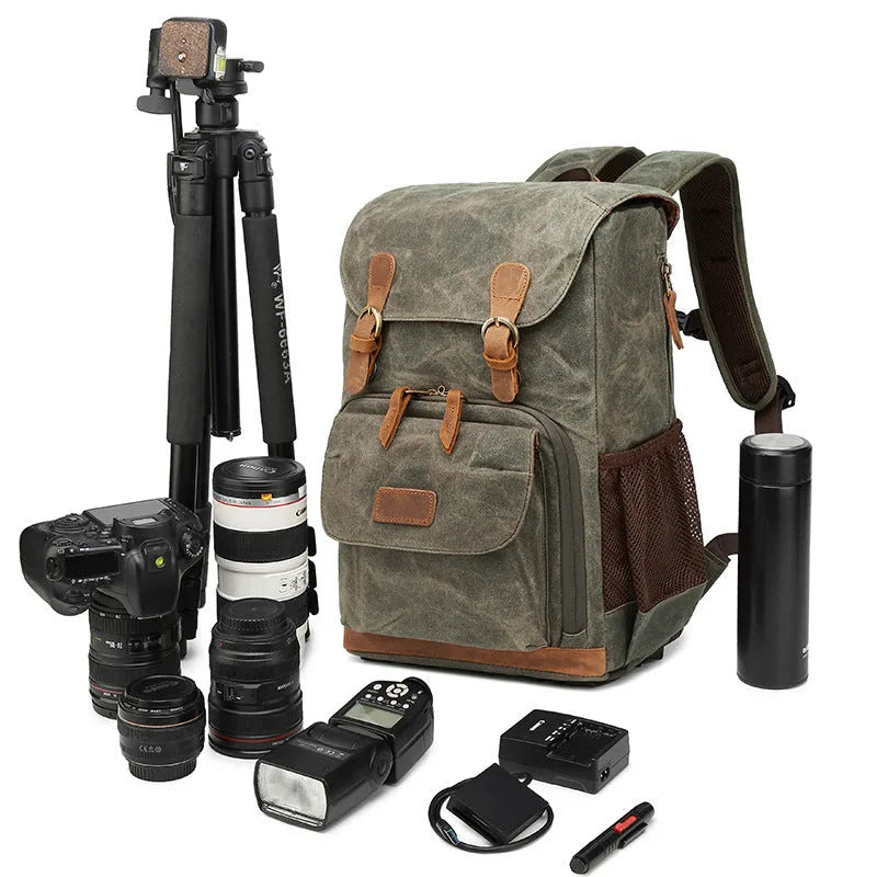 Grey black canvas backpack style DSLR camera bag with straps and zips