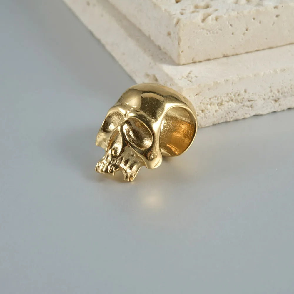 Stainless steel hollow skull Buddha earrings with electroplated finish in four colour variations