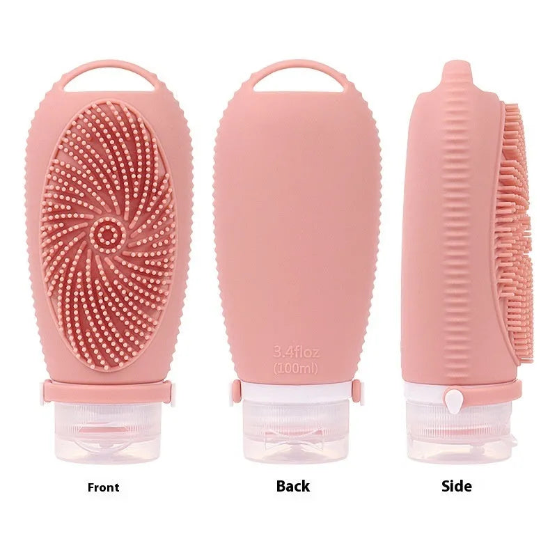 Silicone bath brush storage bottle in eight colour options on a bathroom shelf.