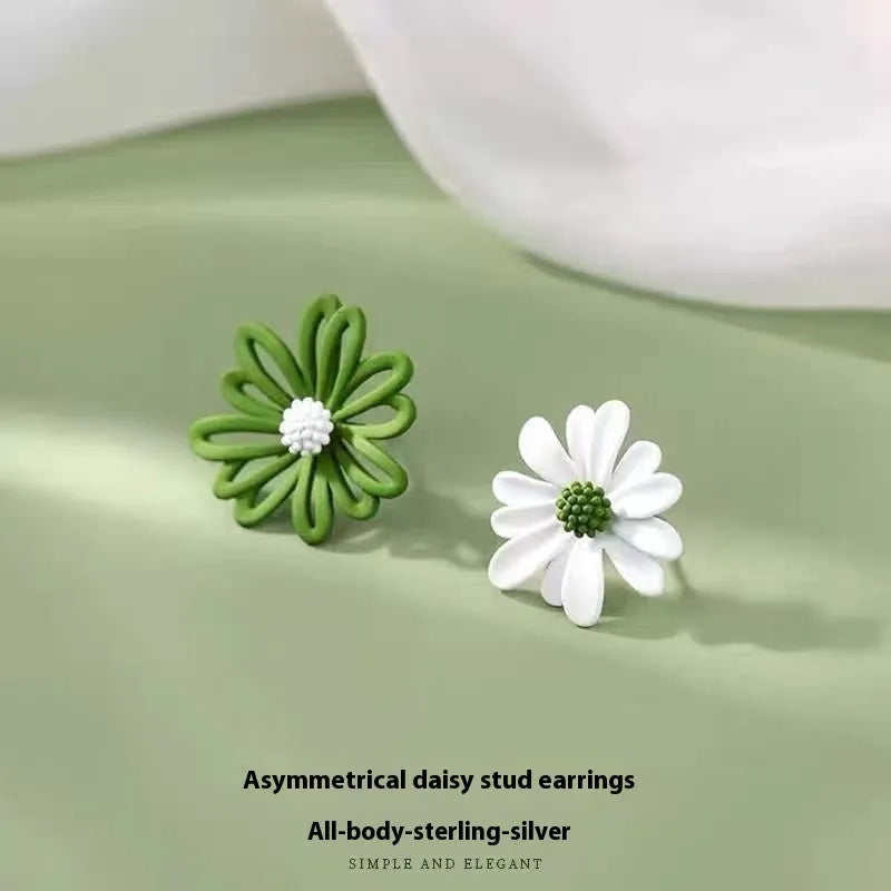 Alloy flower-shaped stud earrings in two-tone blue orange, white green, and yellow white colour combinations.