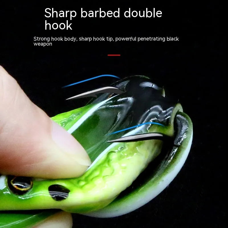 Bionic frog fishing lure with snake head design and double hooks in grass green colour