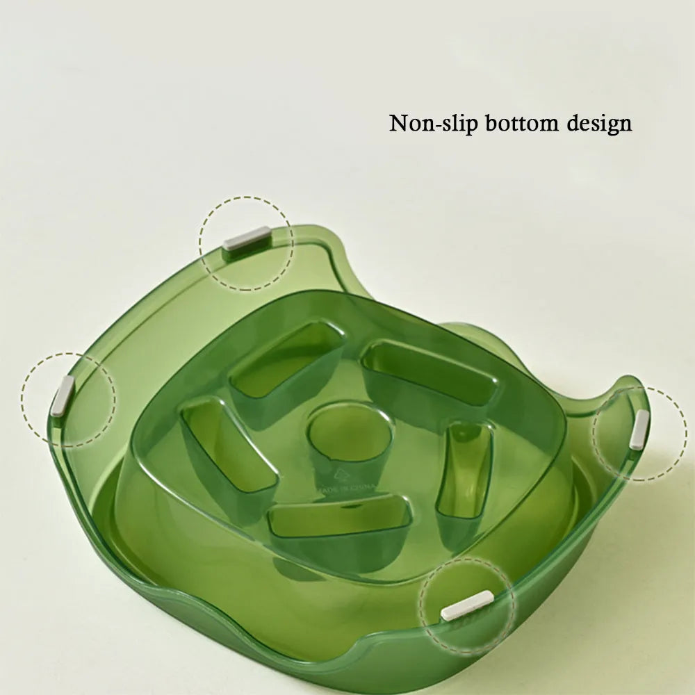 Blue plastic slow feeder dog bowl with anti-choking design on a white surface.