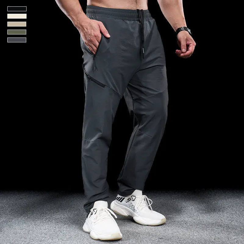 Men's waterproof quick-drying nylon workout trousers with elasticated mid-waist in multiple colour options