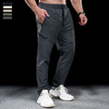 Men's waterproof quick-drying nylon workout trousers with elasticated mid-waist in multiple colour options