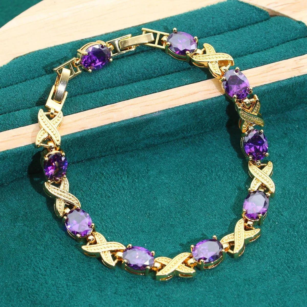 18k gold plated jewellery set with cubic zirconia stones showing necklace, earrings, ring and bracelet