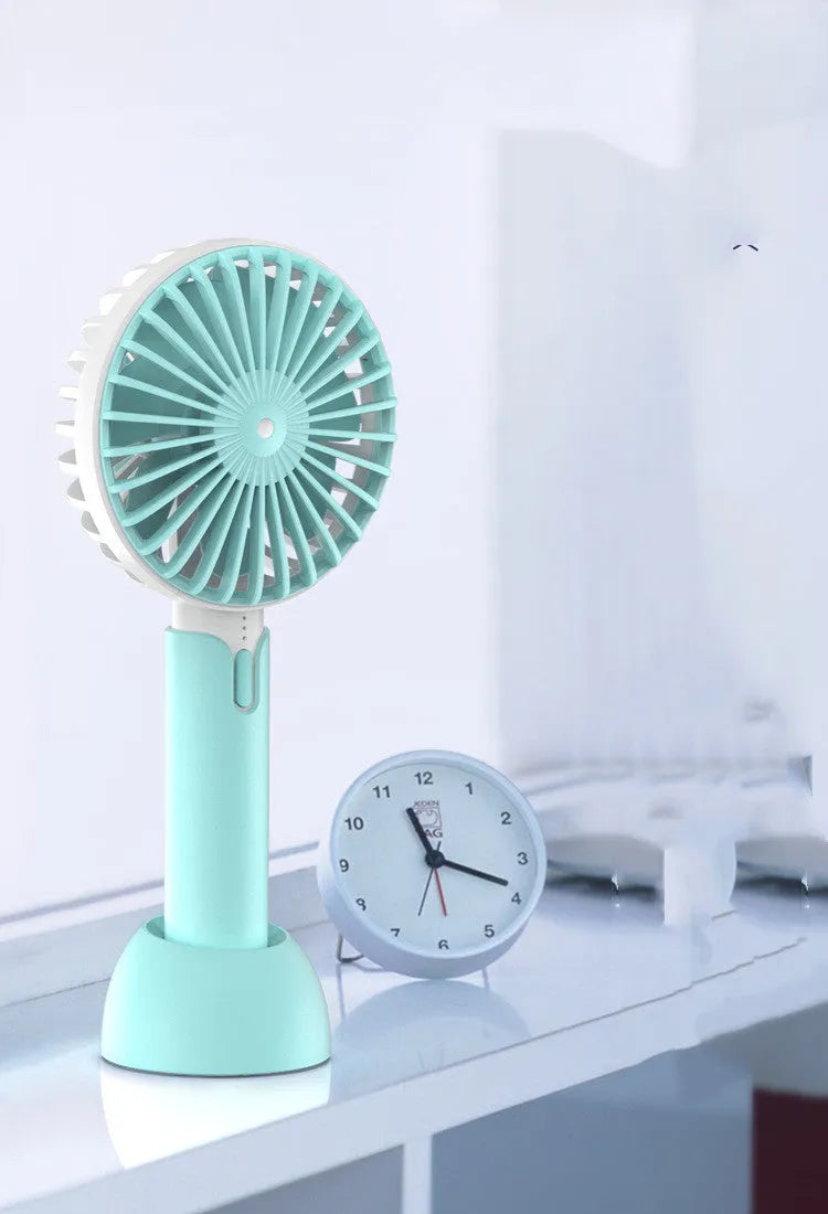 Blue handheld mini silent USB desktop electric fan with oscillating head and three-speed control
