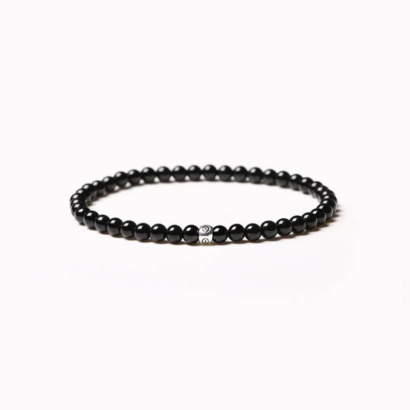 Unisex agate bracelet with obsidian, blue San, and black agate stones in 4mm geometric design