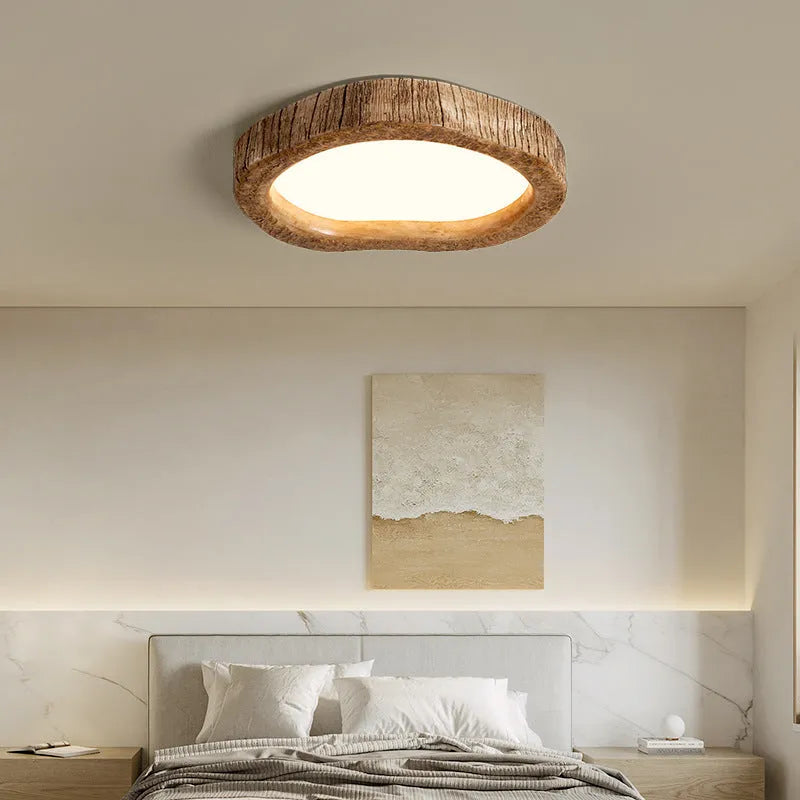 Round New Chinese style ceiling lamp with a wood grain finish, shown in a bedroom setting.