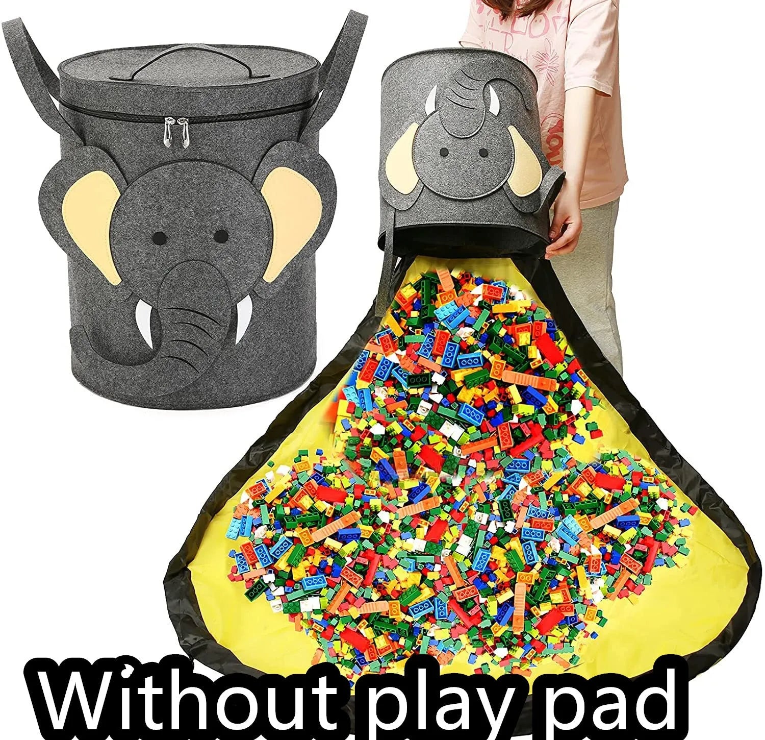 Green felt cube storage bag with pull rope open as a floor play mat for toys.