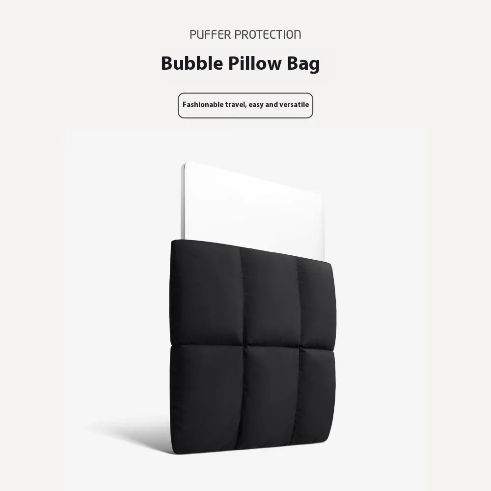 Soft black polyester laptop sleeve for 13-15.6 inch laptops on a table.