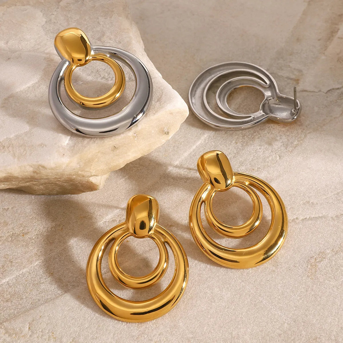 Gold-plated double layer hollow stud earrings with round geometric design