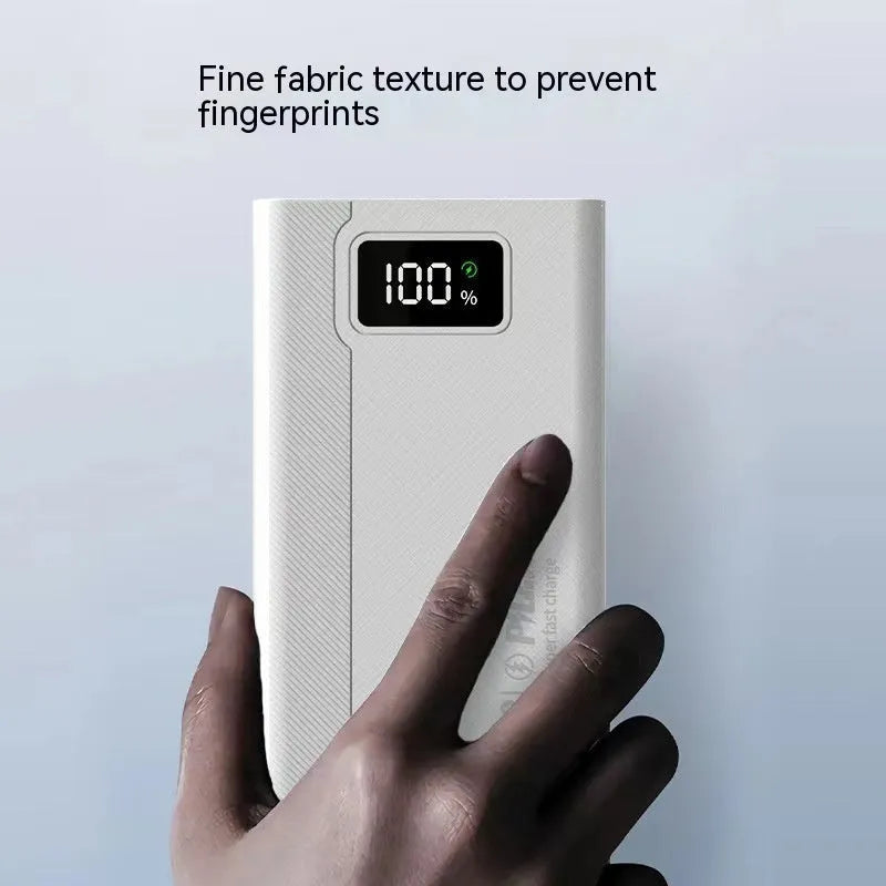 Large black and white plastic power bank showing size comparison and capacity options from 20000mAh to 50000mAh.