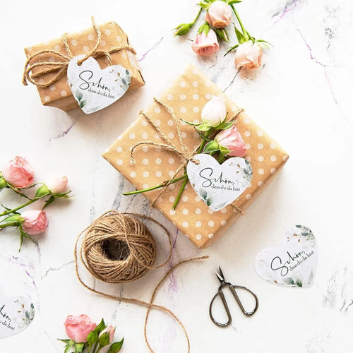 Set of 50 flower heart-shaped paper gift tags in two decorative styles, showing front design.