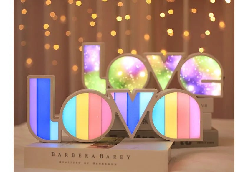 Rainbow style LED LOVE decorative light on a tabletop