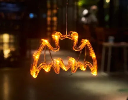 Halloween window hanging LED lights with spider, pumpkin and ghost designs on suction cups