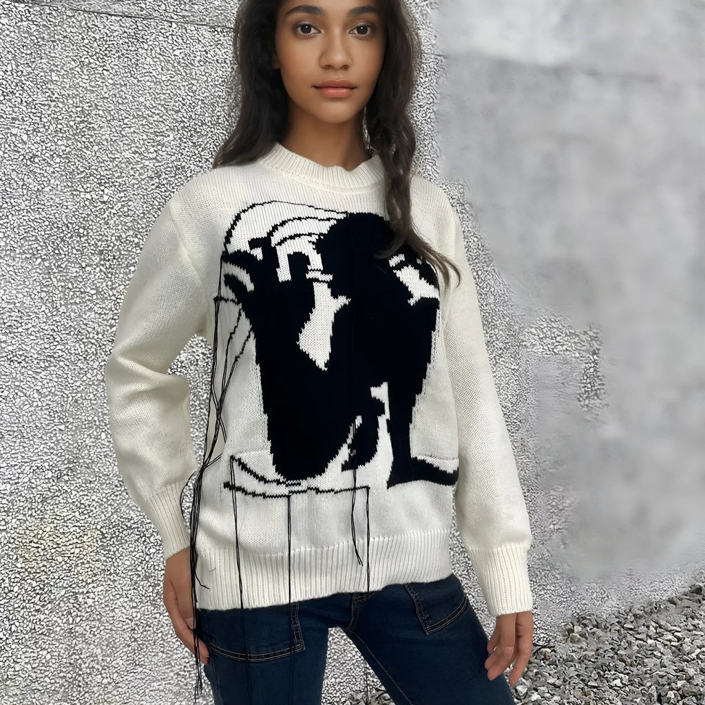 Women's loose Alpaca wool sweater with tassel design and abstract pattern in grey colour