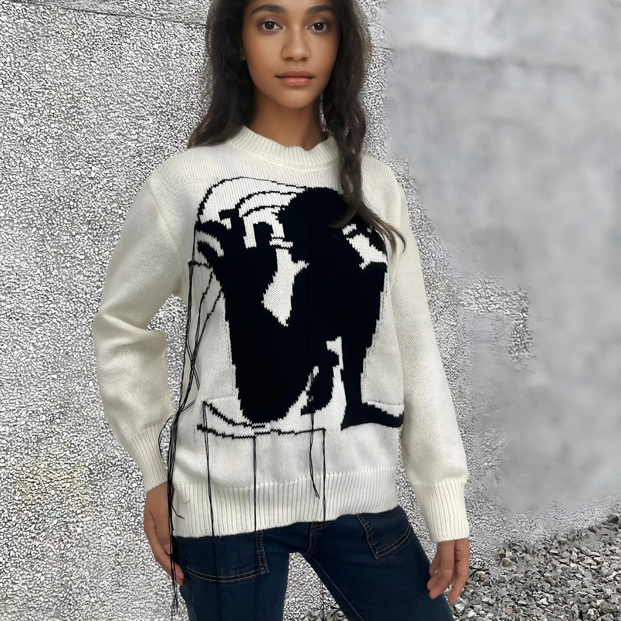 Women's loose Alpaca wool sweater with tassel design and abstract pattern in grey colour