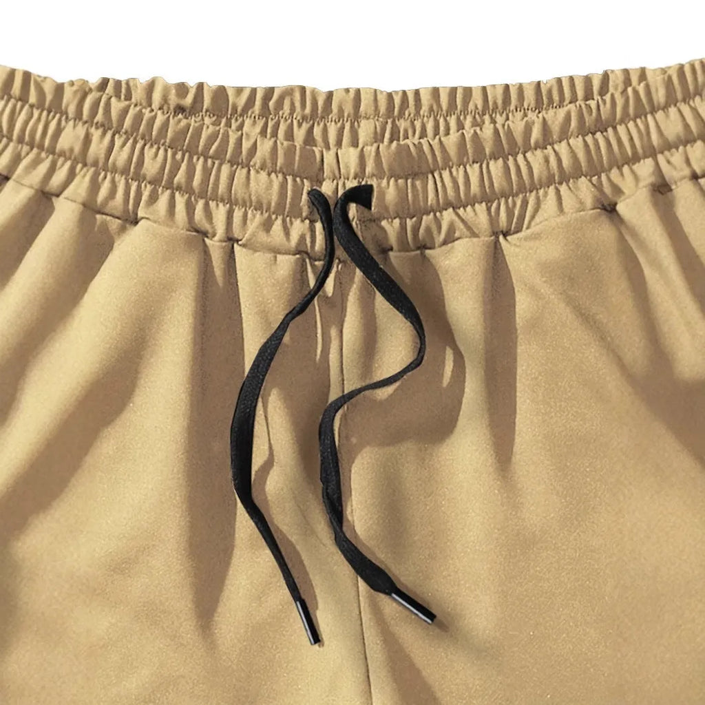 Men's khaki sports shorts with coconut print design and straight leg cut