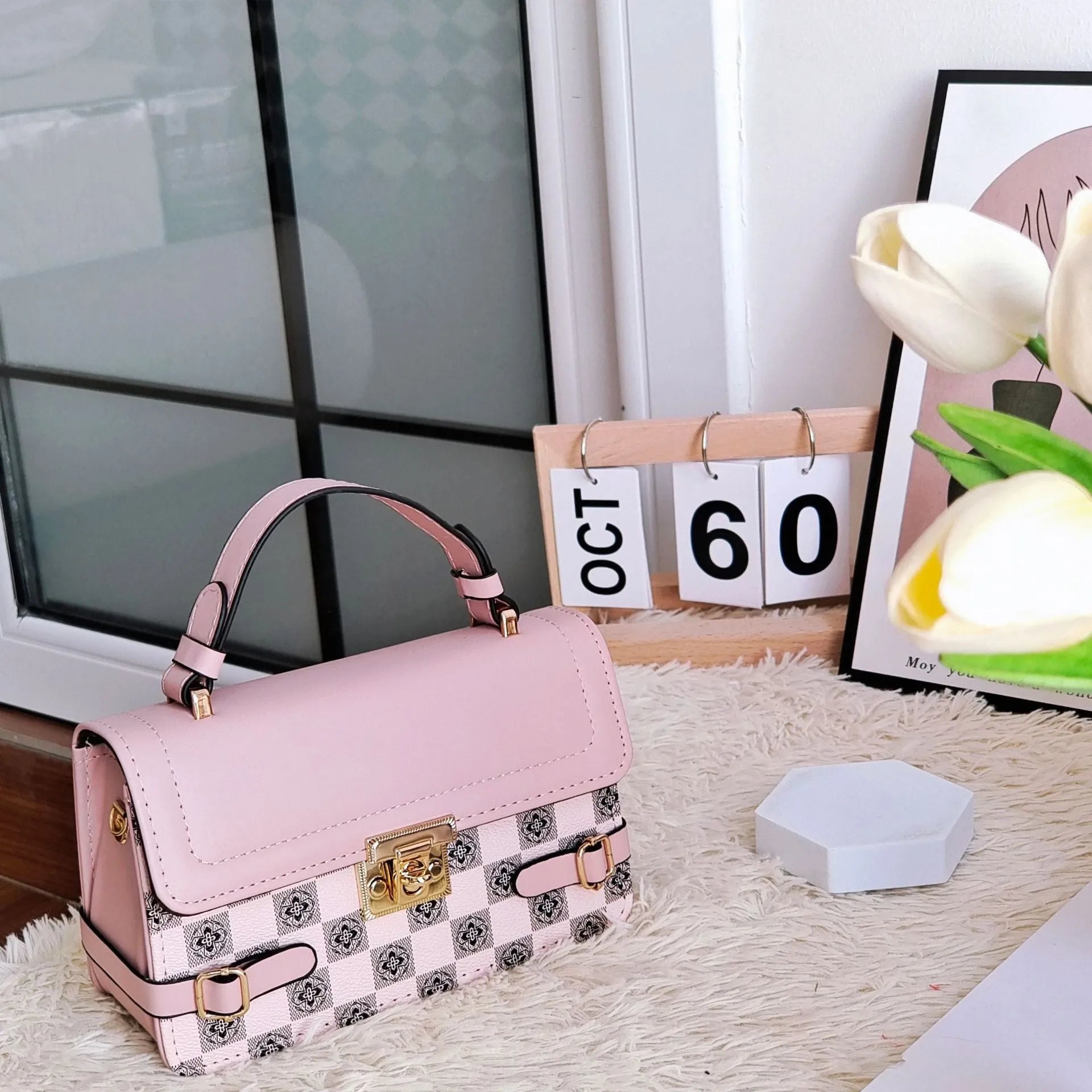 Retro patterned women's crossbody bag in a horizontal rectangle shape, shown in apricot colour.