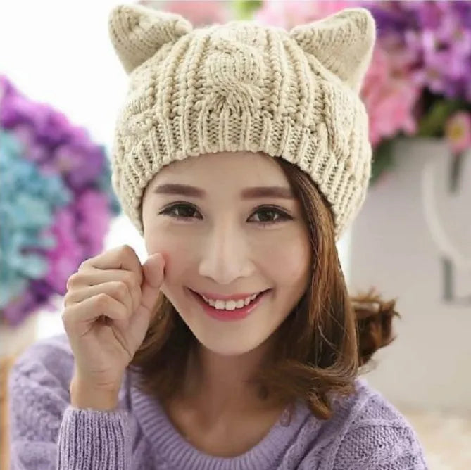 Hand knitted wool cat ear beanie in red colour for winter wear