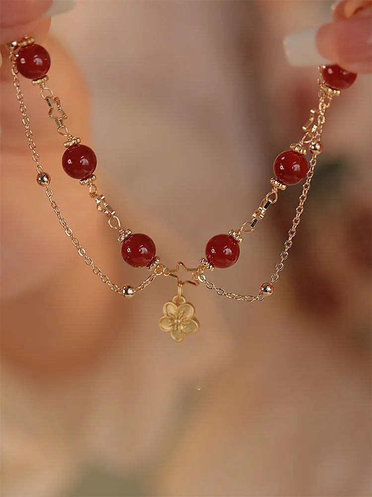 Women's double layer bracelet with natural red agate and peach blossom floral design in red colour