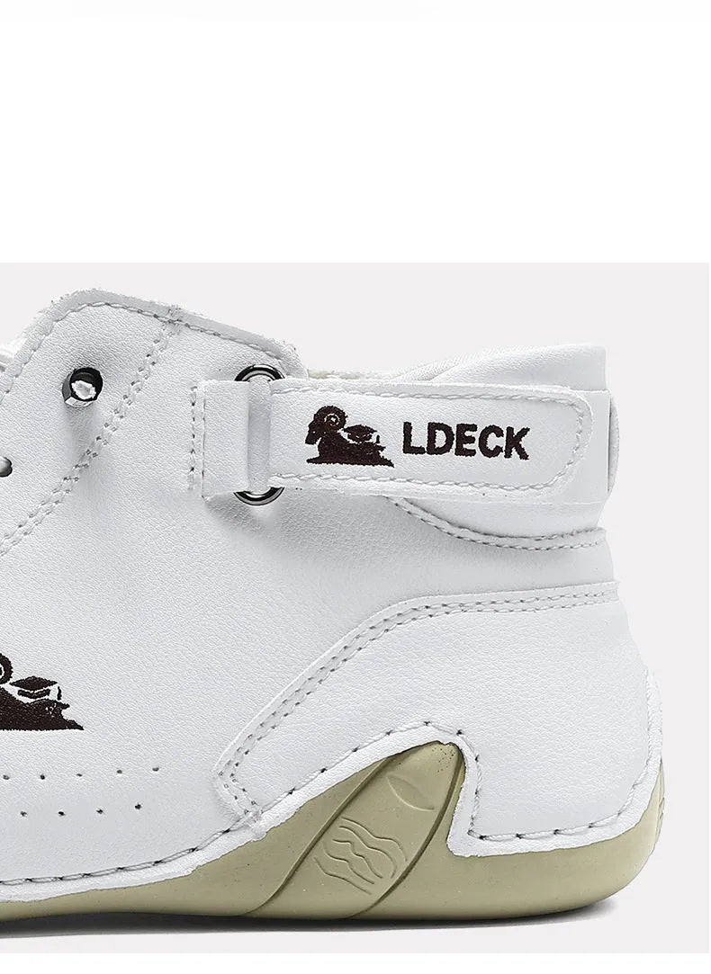 Men's khaki high top Octopus shoes with a round toe and rubber sole on a neutral background.