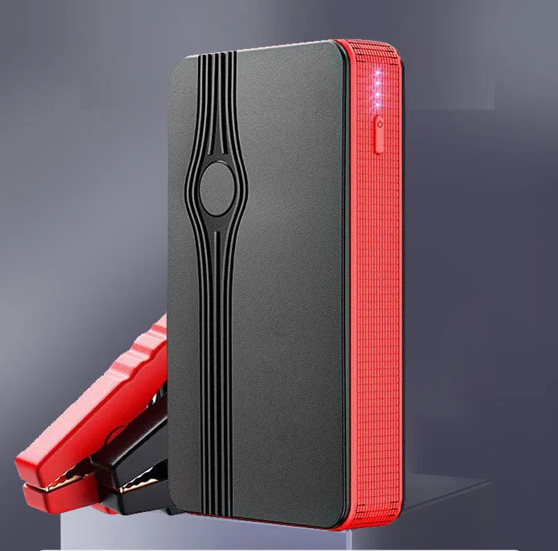 Red K4-E automobile emergency starting power supply unit with data cable for vehicle jump-starting and device charging