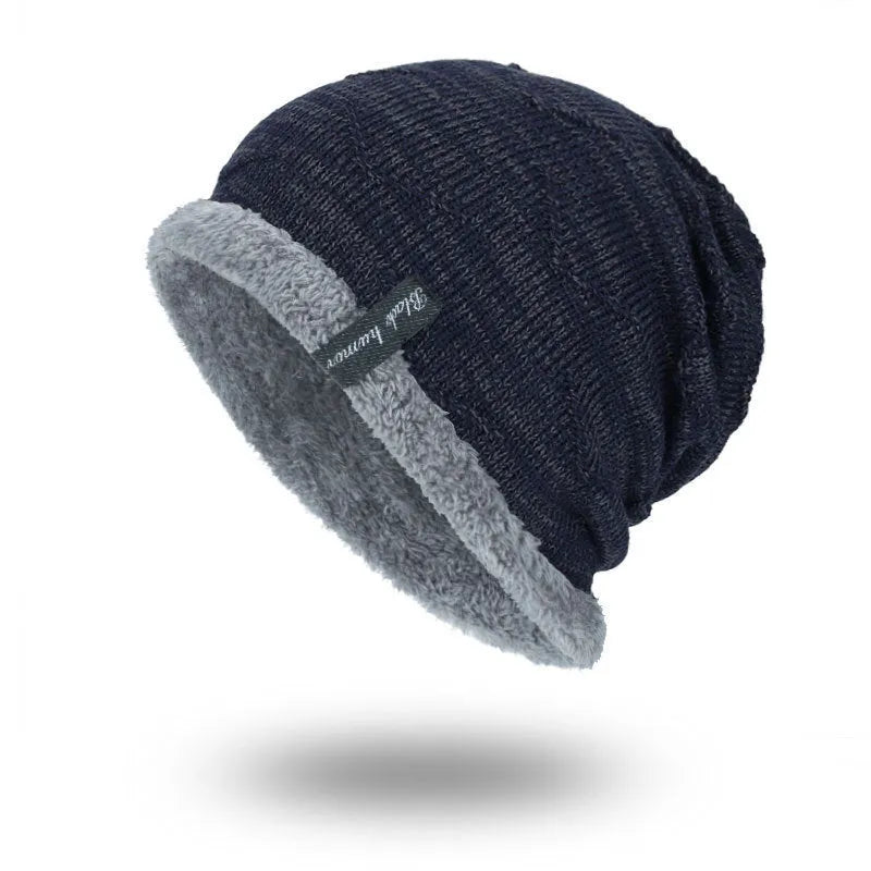 Diagonal hook knitted acrylic beanie in black, showing textured knit pattern
