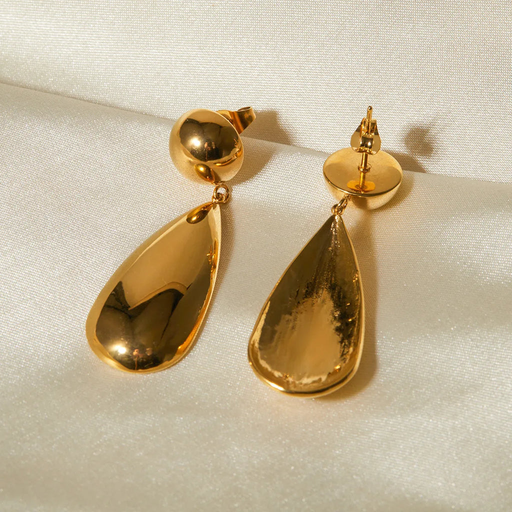 Gold-coloured stainless steel earrings with geometric water drop pendant and hemisphere design