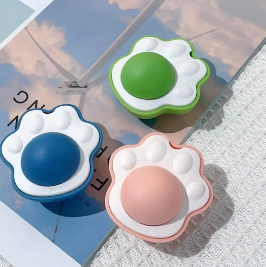 Four colourful catnip balls with textured surfaces for dental cleaning and feline play