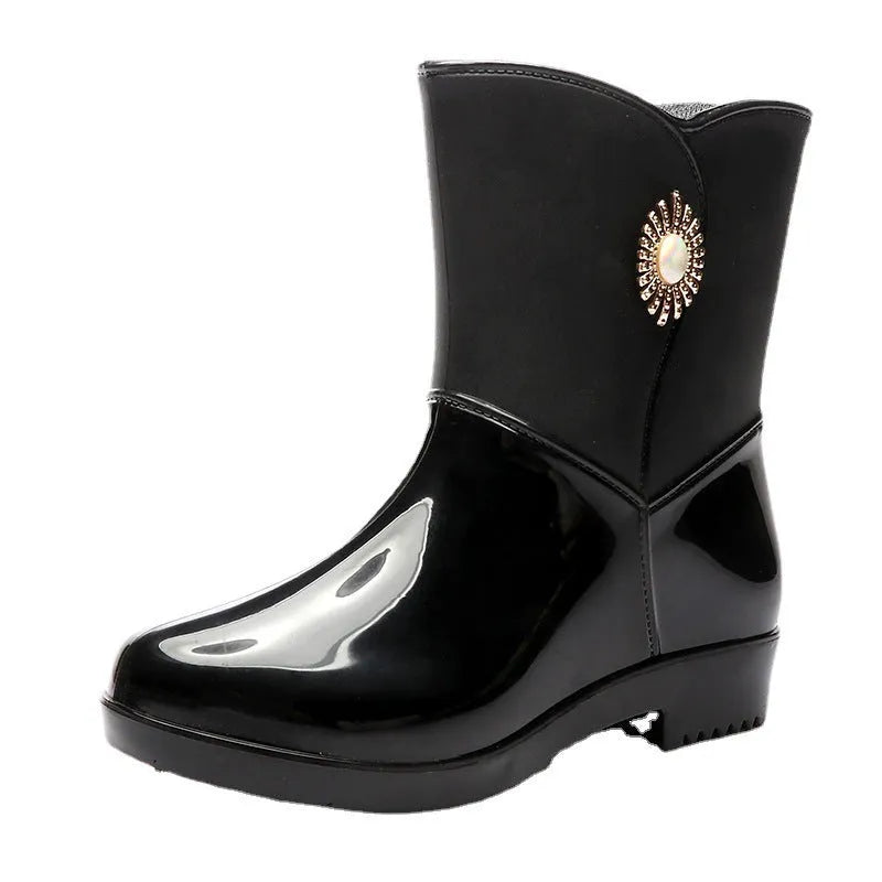Women's mid-length PVC rain boots in purple, black, or beige with non-slip sole