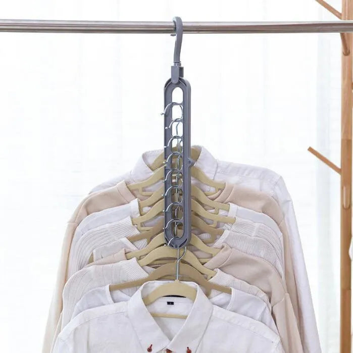 Plastic clothes hanger with rotating hook in pink colour