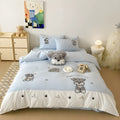 Schnauzer cartoon patterned bedding set with quilt cover, sheet, and pillowcases on bed
