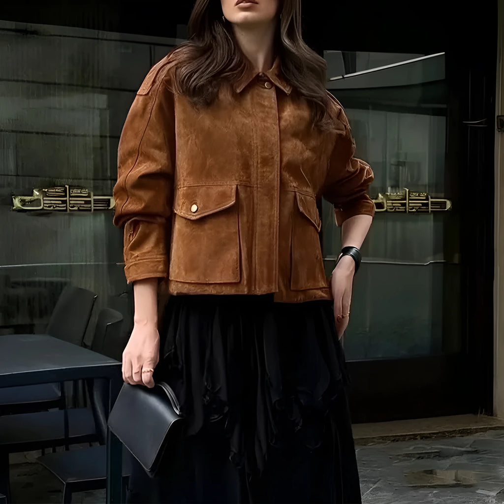 Women's brown polyester suede coat with regular sleeves on a hanger.