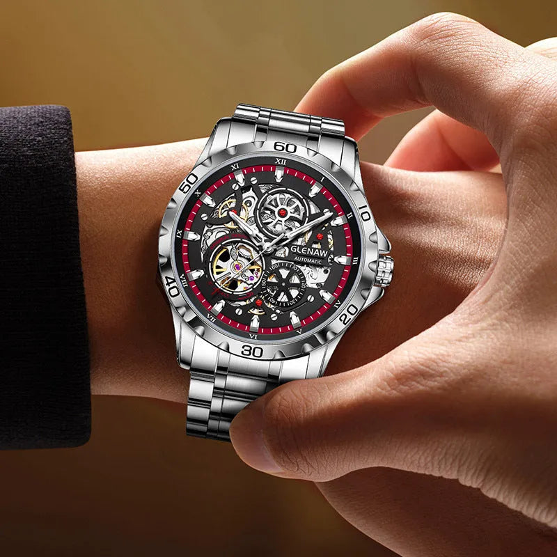Men's automatic mechanical watch with hollow-out dial showing movement and luminous hands on stainless steel band