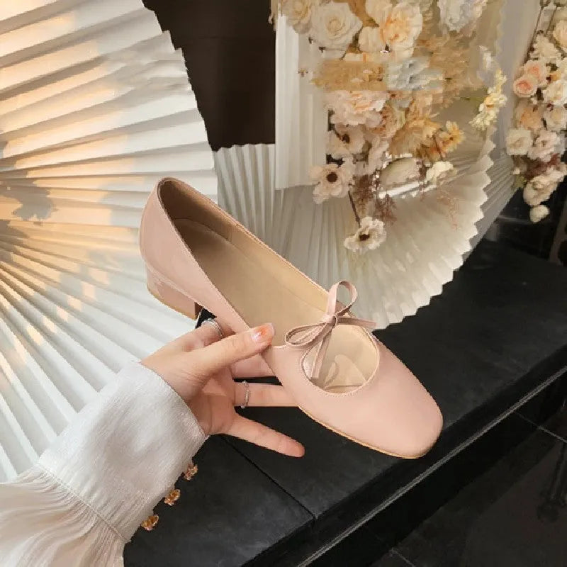 Women's bow shallow mouth Mary Jane shoes in solid nude pink colour with microfiber upper
