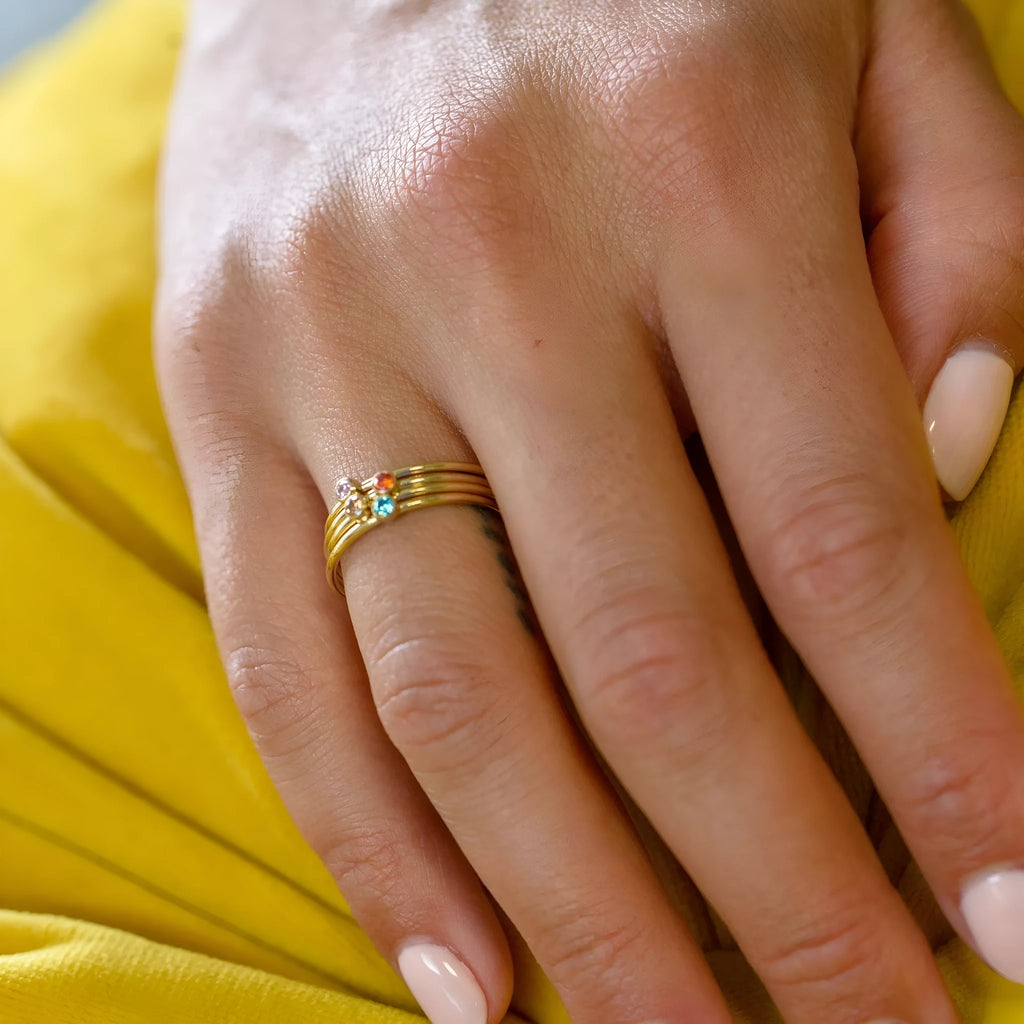 December birthstone titanium steel ring with geometric shape and superimposed engraving.