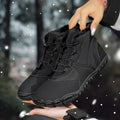 Unisex waterproof snow boots with fleece lining and a black rubber sole on a snowy background.