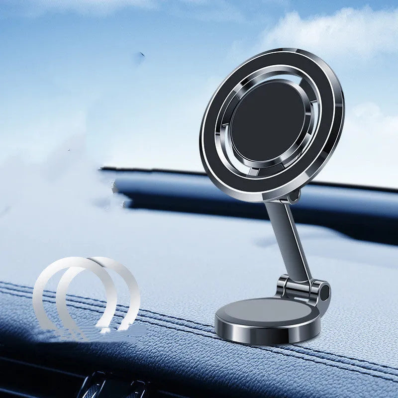 Black car phone holder with magnetic clip mount attached to a vehicle instrument panel