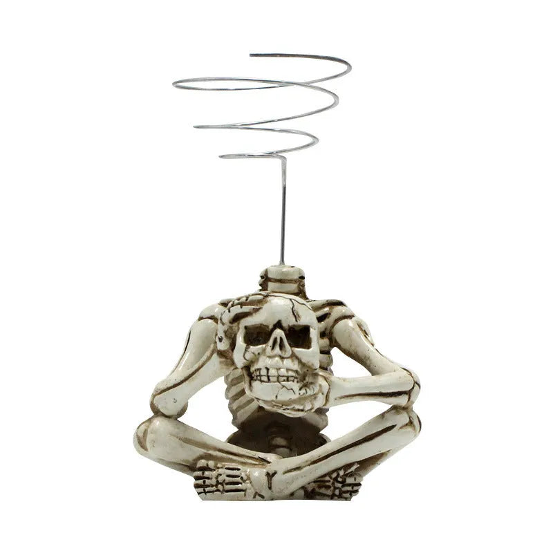 Gothic skull design resin bracket for Tillandsia air plants on iron base, measuring 7cm wide by 8cm deep by 12.5cm high