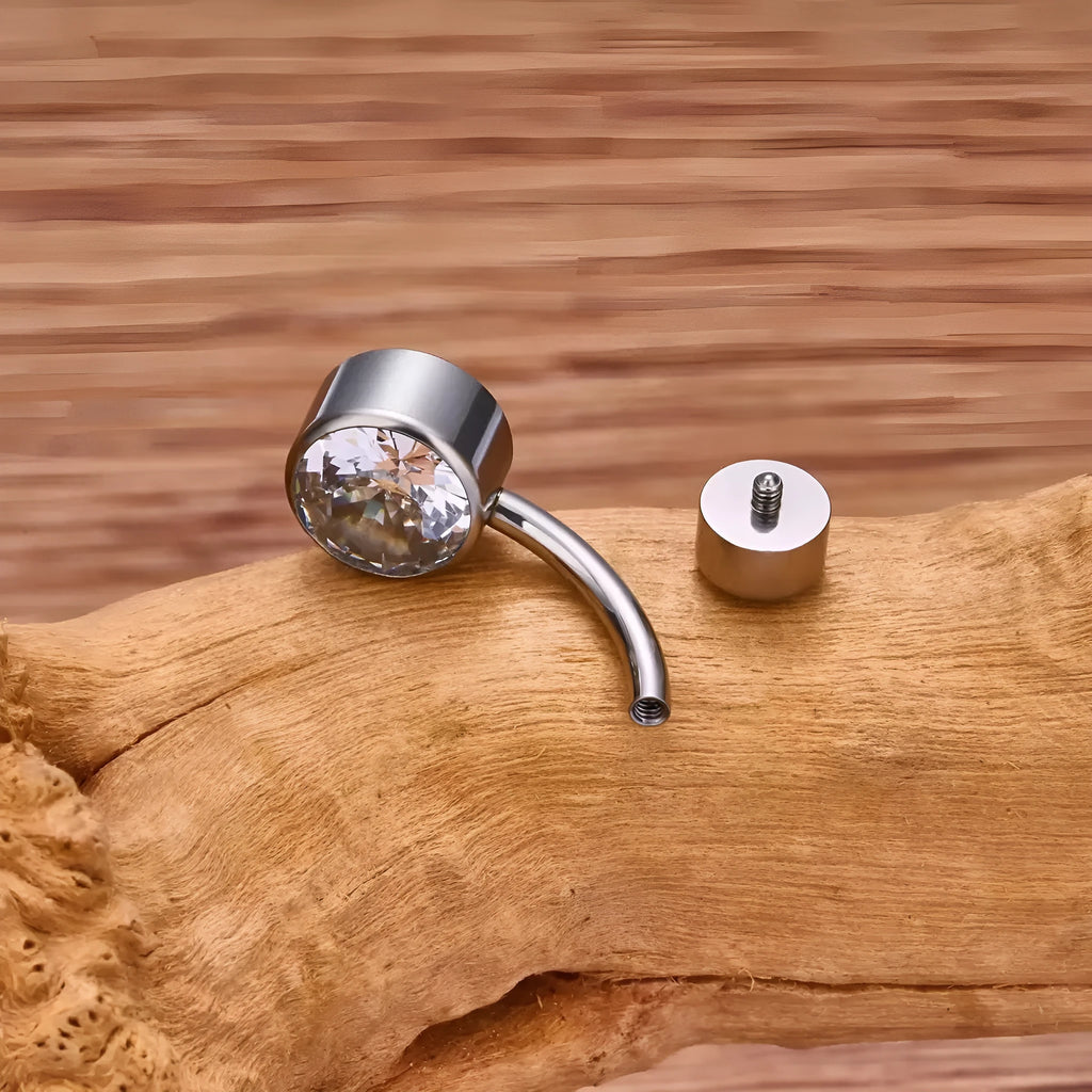 Titanium alloy double-headed zircon navel stud showing colour options and 1.6mm thickness