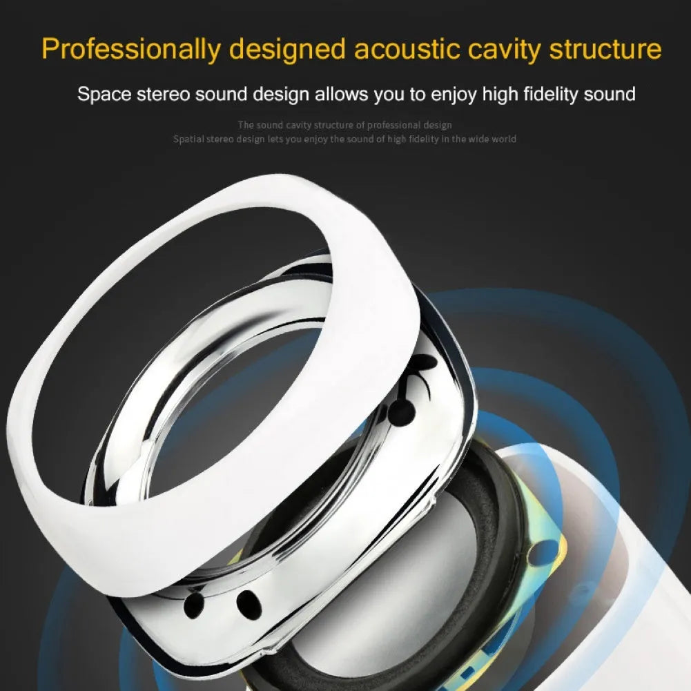 Compact black desktop speakers with 3.5mm cable and volume scroll wheel