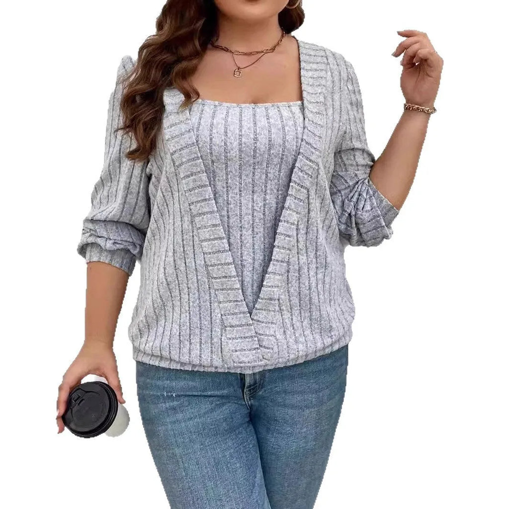 Women's solid colour V-neck long sleeve false two-piece suit in a loose ribbed fabric.