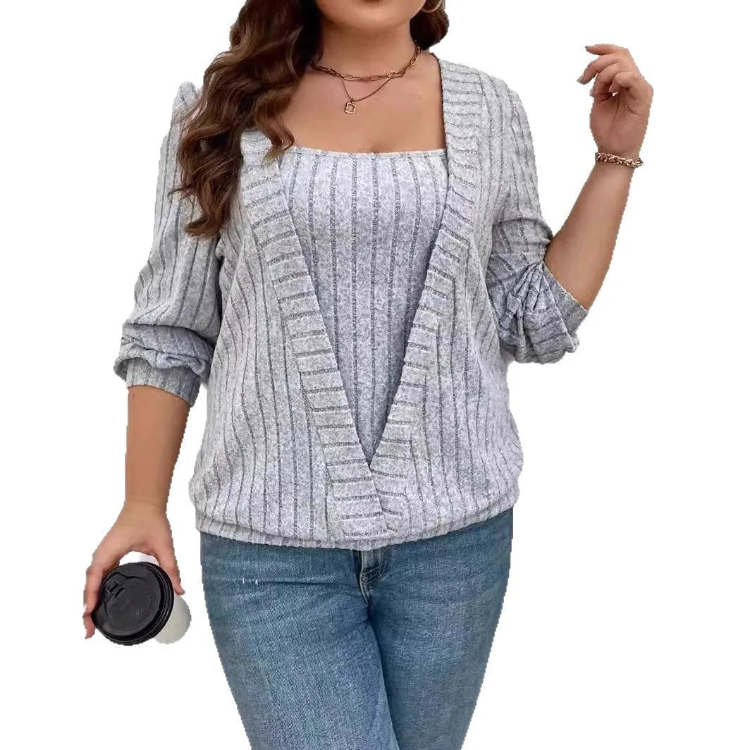 Women's solid colour V-neck long sleeve false two-piece suit in a loose ribbed fabric.