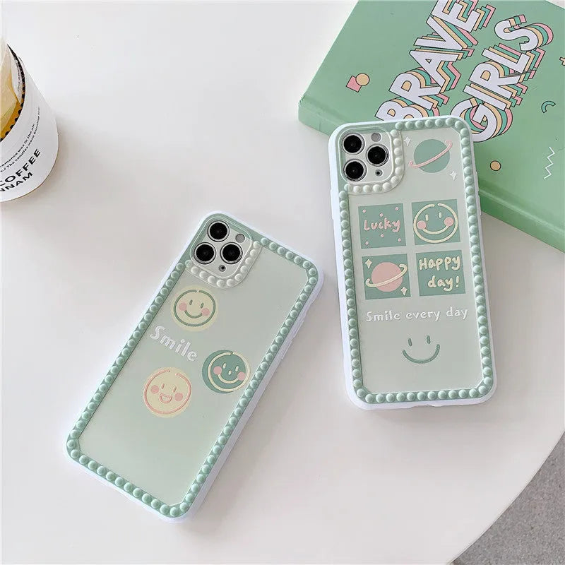 Green iPhone case with smiley face geometric patterns and polka dot frame designs
