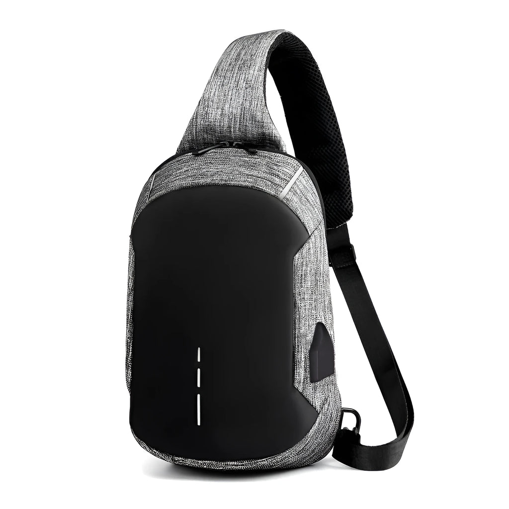 Small square dark blue Oxford cloth chest bag with a single strap and zipper, shown worn across the chest.