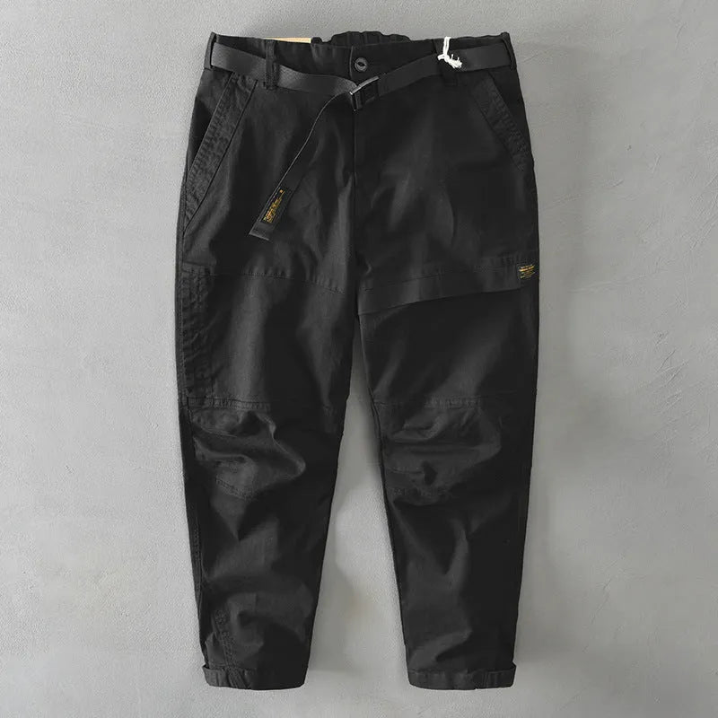 Men's cotton overalls with elastic waistband in army green colour showing loose trousers design