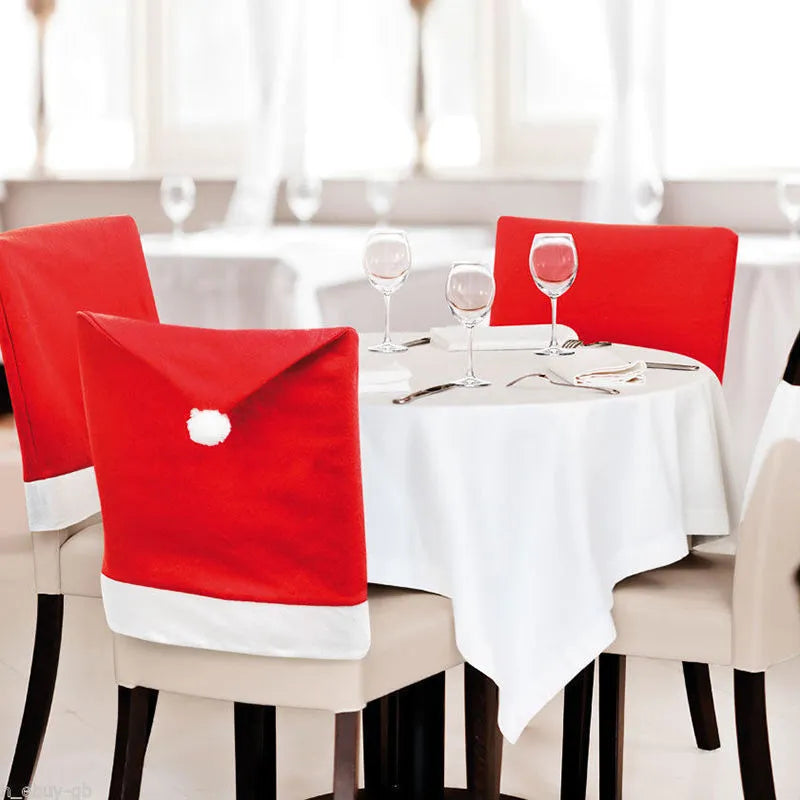 Christmas chair cover set showing Santa Claus, Snowman and Santa hat designs on standard dining chairs