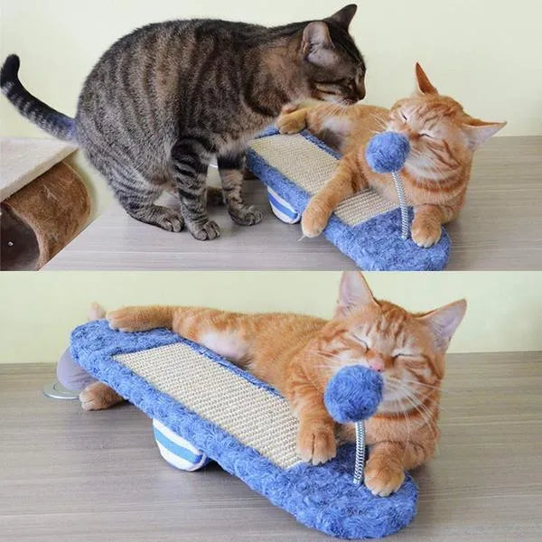 Royal blue cat seesaw toy with scratch board surface on a light background
