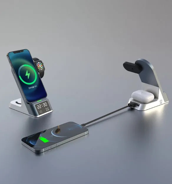 Black six-in-one wireless charging alarm clock station with digital display and charging pad.